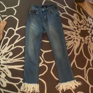 Super cute and trendy fringe jeans